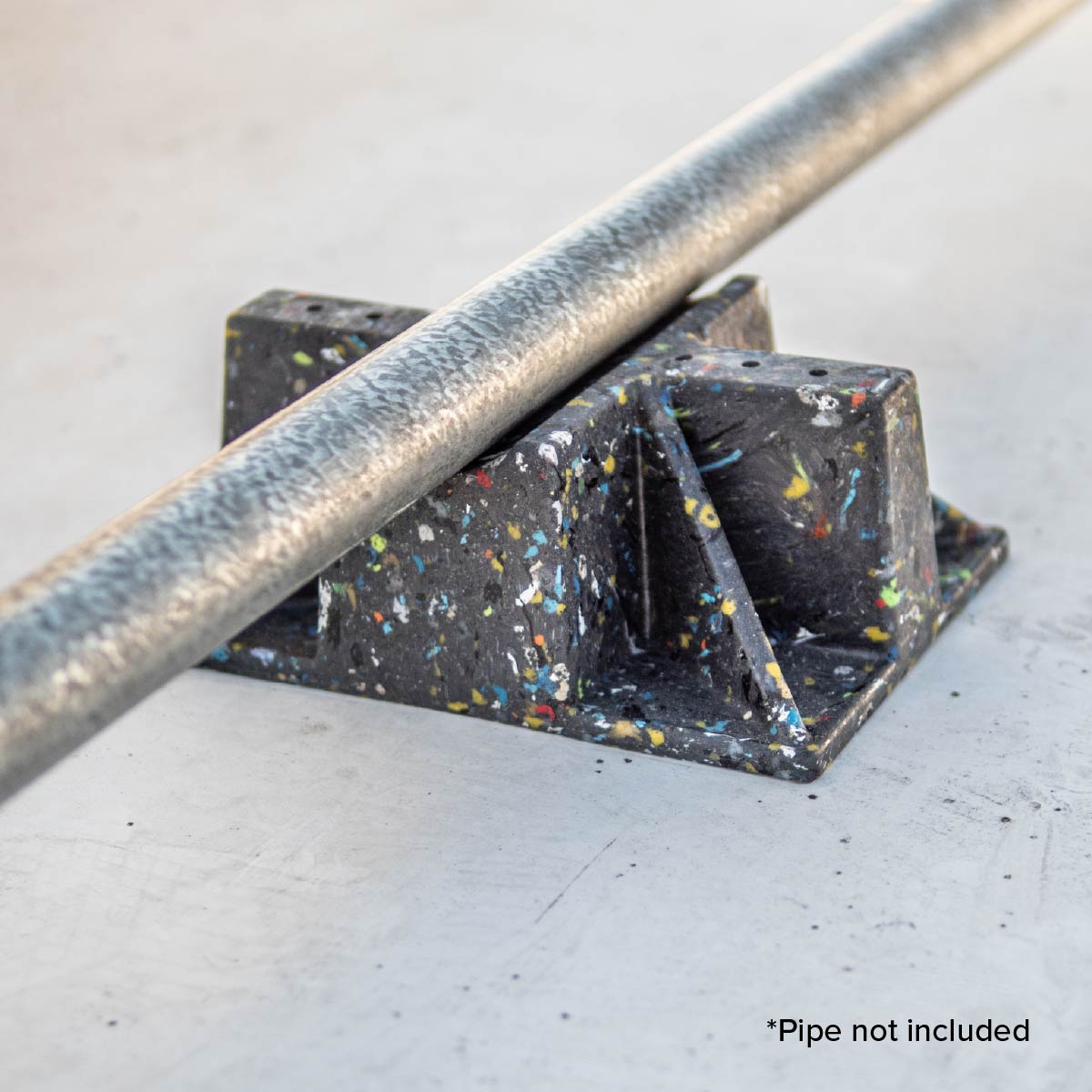 Pipe resting on saddle support base